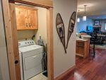Washer and Dryer tucked away in closet near kitchen area. Detergent provided.